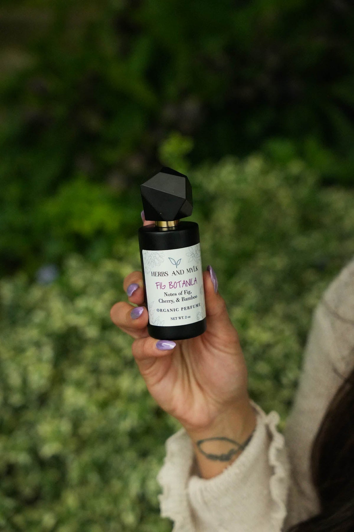 Fig Botanica organic perfume bottle with pink shimmer mica