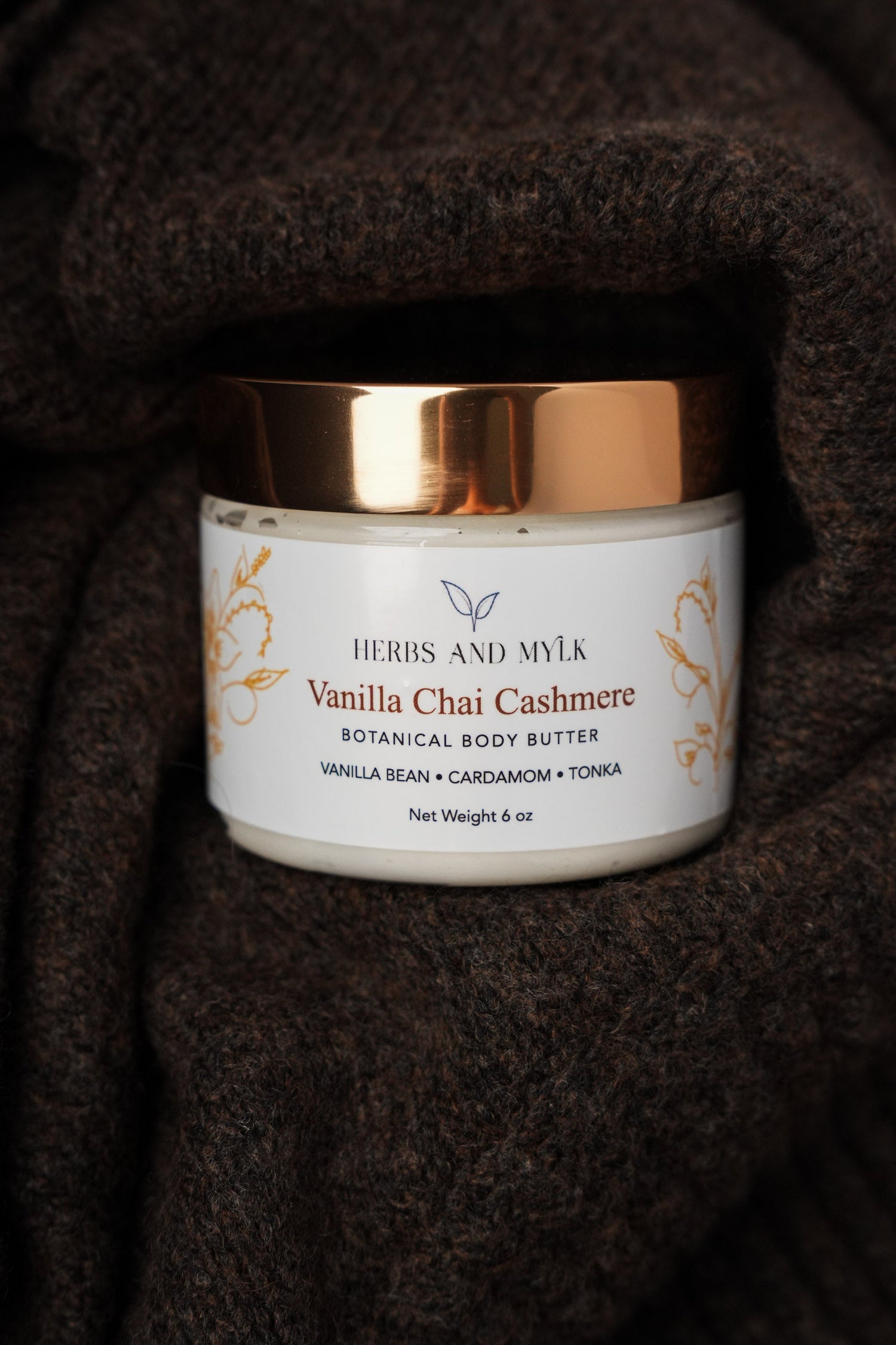 Vanilla Chai Cashmere Botanical Body Butter jar with vanilla bean and cardamom