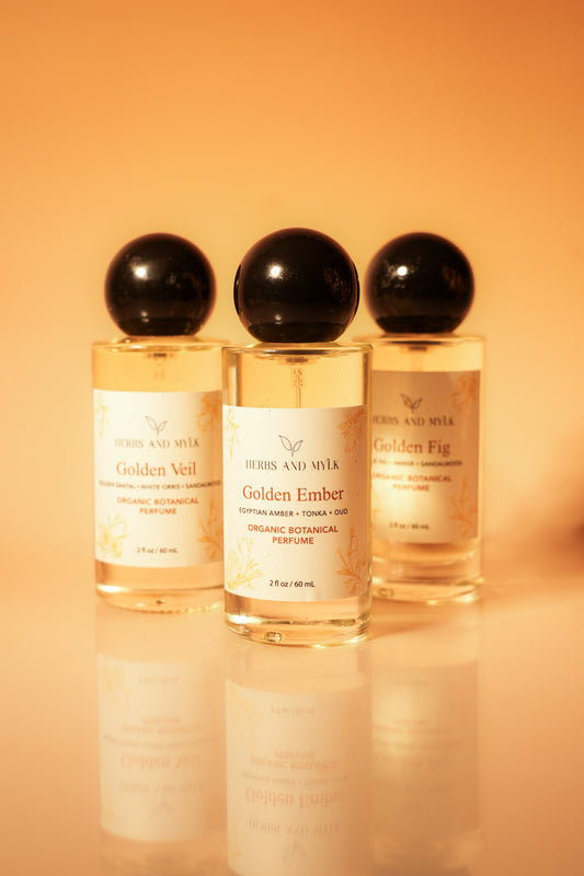 The Golden Perfume Trio gift set with three perfume bottles