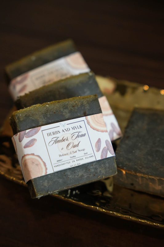 Amber Tonka Oud botanical cleansing bar with activated charcoal